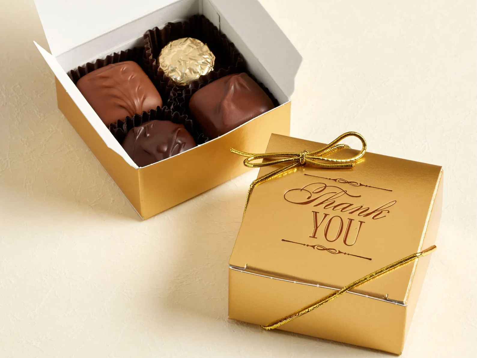 Gourmet chocolate boxes for elegant Halloween baby shower favors