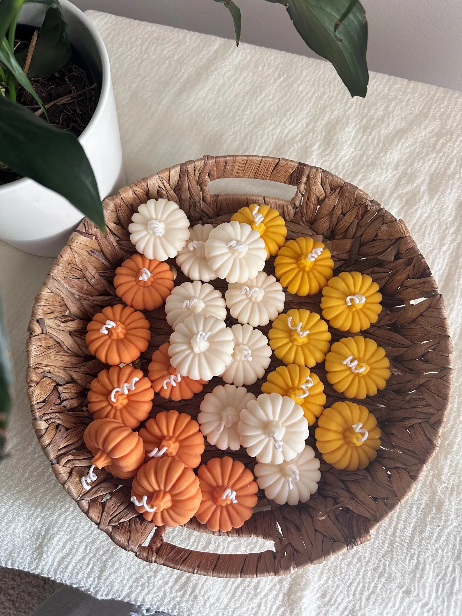 Mini pumpkin candles for Halloween baby shower favors